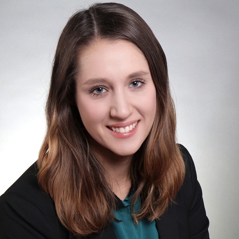 Ein Foto von Loretta Hölzel. Sie ist eine der beiden Referentinnen des iga.Online-Seminars zum Thema Positive Psychologie. 