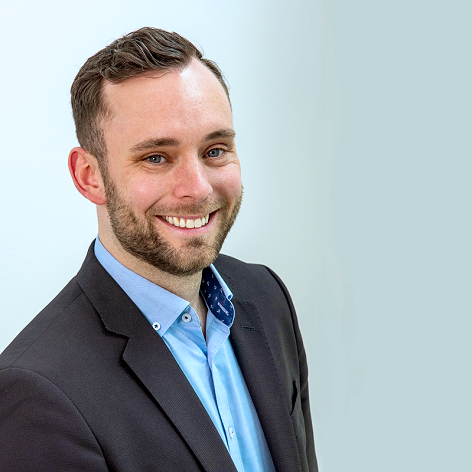 Ein Foto von Dominik Busch, Mitarbeiter der vivida BKK