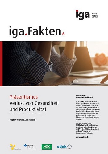 Titelbild iga.Fakten 6: Ein Mann sitzt an einem Tisch und stützt seinen gesenkten Kopf mit beiden Armen ab. Eine Person sitzt ihm gegenüber und tippt mit dem Zeigefinger auf ein Papier mit Zielvorgaben.
